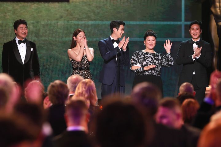 "Parasite" cast members Song Kang-ho, Cho Yeo-jeong, Choi Woo-shik, Lee Jung-eun, Chang Hyae-jin and Lee Sun-kyung present a clip of "Parasite" onstage during the 26th Annual Screen Actors Guild Awards.