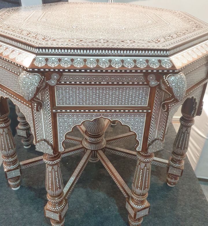 This table carved in Sheesham wood has over lakhs of depressions manually filled with acrylic material . A Hoshiarpur-based artist took six years to complete this masterpiece.