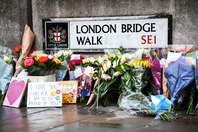 Flowers and a pictures are left in memory of Jack Merritt.