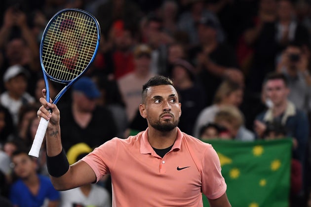 Australia's Nick Kyrgios celebrates victory against Italy's Lorenzo Sonego during their men's singles match on day two of the Australian Open tennis tournament in Melbourne on January 21, 2020.