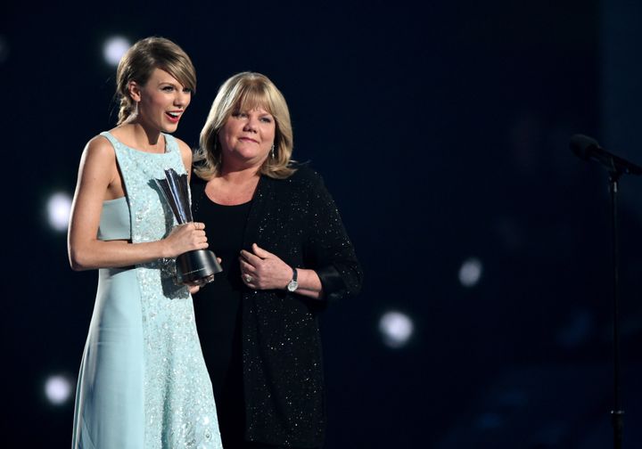 Taylor Swift and her mother, Andrea Swift, onstage during the 50th Academy of Country Music Awards in 2015.