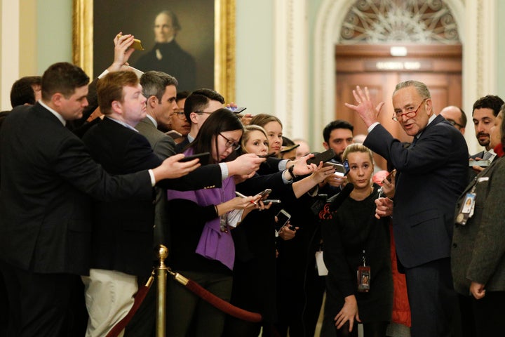 Senate Minority Leader Chuck Schumer speaks to members of the news media during the Senate impeachment trial of President Donald Trump.