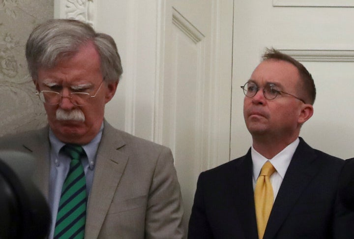 By the same 53-47 party-line, Republicans turned away witnesses with front-row seats to Trump’s actions including acting John Bolton (left), the former national security adviser critical of the Ukraine policy, and White House chief of staff Mick Mulvaney (right).