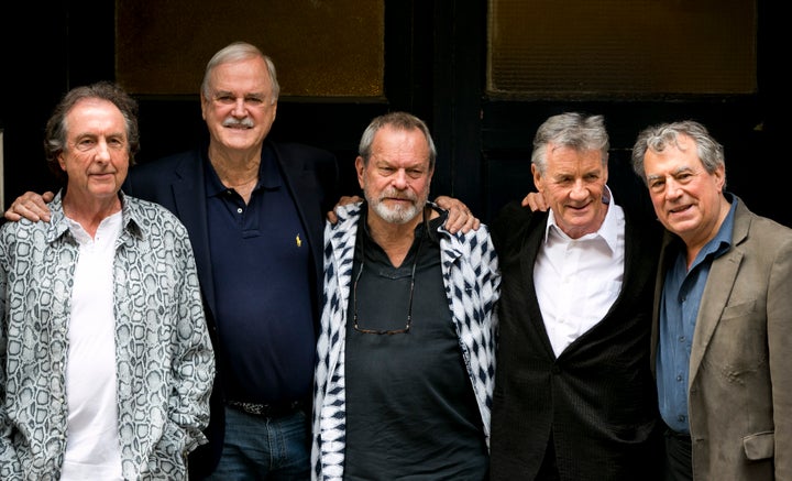 From left, Eric Idle, John Cleese, Terry Gilliam, Michael Palin and Terry Jones pose for photographers in London in this photo from June 30, 2014.