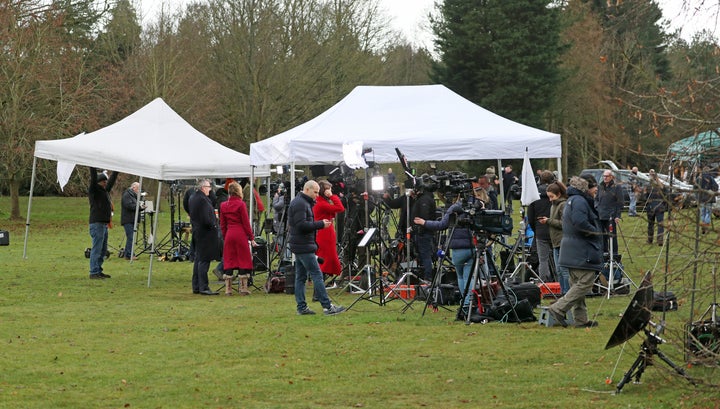 Members of the media gather Sandringham Estate during the crisis talks over Meghan and Harry's exit.