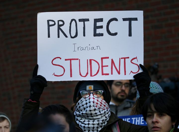 Cassidy Taylor offers support to a deported Iranian student while protesting outside the federal courthouse in Boston on Jan. 21, 2019. The Iranian student was removed from the U.S. in defiance of a court order.
