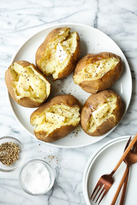 Get the recipe for Instant Pot Baked Potatoes from Damn Delicious