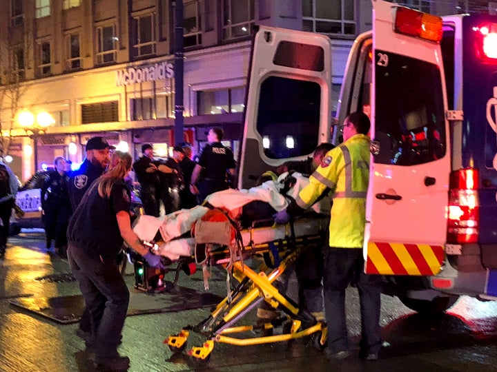 First responders give aid to a shooting victim in downtown on January 22, 2020 in Seattle, Washington.