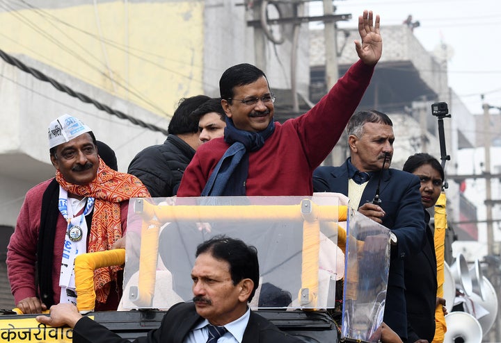 NEW DELHI, INDIA - JANUARY 22: Delhi Chief Minister Arvind Kejriwal waves during a road show ahead of the Delhi Vidhan Sabha elections, at Badli on January 22, 2020 in New Delhi, India. 