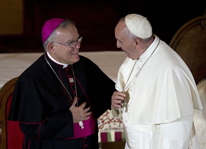 Pope Francis speaks with the Archbishop of Philadelphia Charles Chaput at St. Charles Borromeo Seminary in Wynnewood, Pennsylvania on September 27, 2015. 