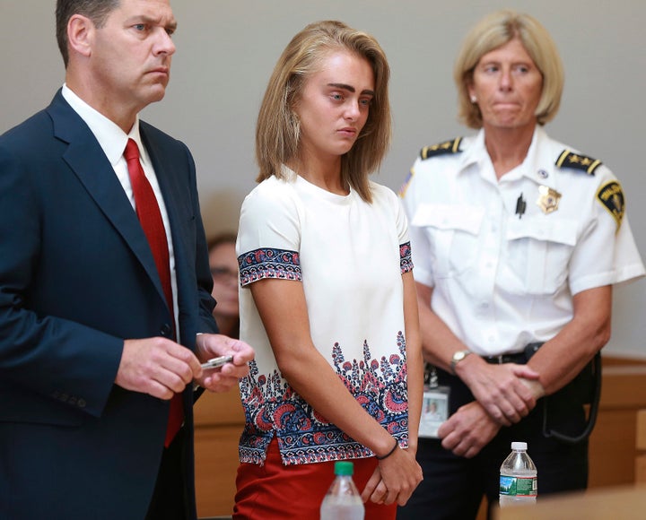 In this Aug. 3, 2017, file photo, Michelle Carter listens to her sentencing for involuntary manslaughter for encouraging 18-year-old Conrad Roy III to kill himself in July 2014. At left is her defense attorney Joseph Cataldo.
