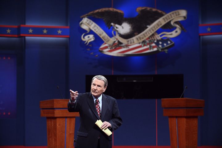 Moderator Jim Leher stands on stage before a presidential debate on October 3, 2012 in Denver, Colorado. 