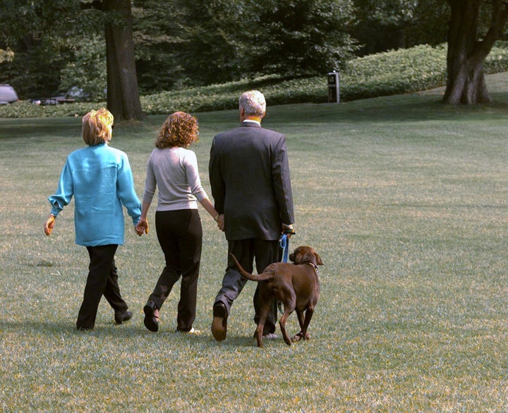 President Bill Clinton leaving the White House for Martha's Vineyard with Hillary Clinton and their daughter Chelsea in August 1998.