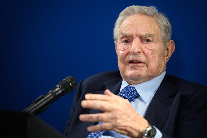 Investor and philanthropist George Soros goes after Donald Trump and Facebook at the World Economic Forum in Davos on Thursda