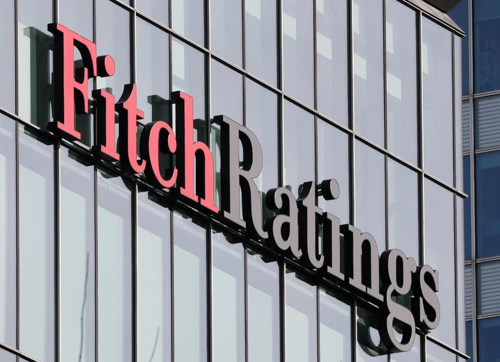 The Fitch Ratings logo is seen at their offices at Canary Wharf financial district in London,Britain, March 3, 2016. REUTERS/Reinhard Krause