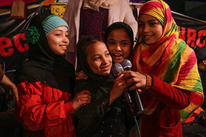 In this photograph taken on January 7, 2020, children shout slogans during a demonstration at Shaheen Bagh area.