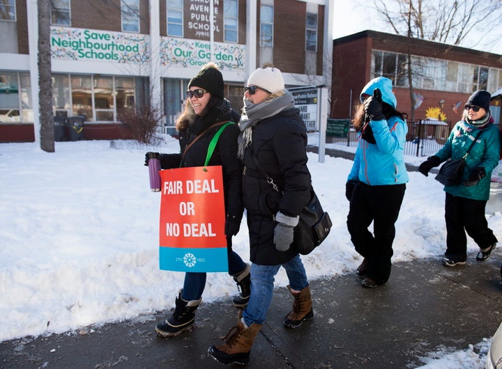 Teachers with the Elementary Teachers' Federation of Ontario strike in Toronto on Jan. 20, 2020.