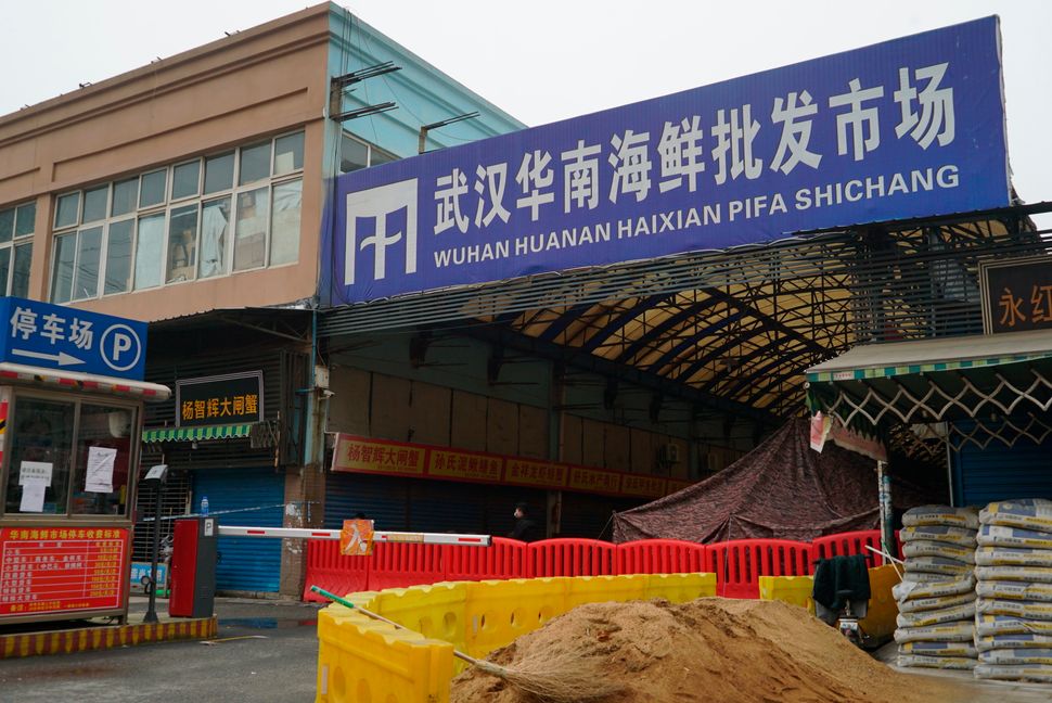 The Wuhan Huanan Wholesale Seafood Market, where a number of people related to the market fell ill with a virus, sits closed in China's central city of Wuhan on Tuesday.