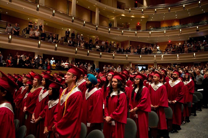 Graduates at MacEwan University are seen in Edmonton in June 2019.