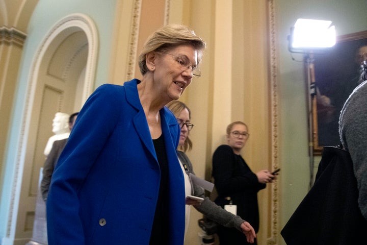 Sen. Elizabeth Warren, D-Mass., walks outside the Senate chamber at the Capitol in Washington during a break in the impeachment trial of President Donald Trump, on Jan. 24, 2020.