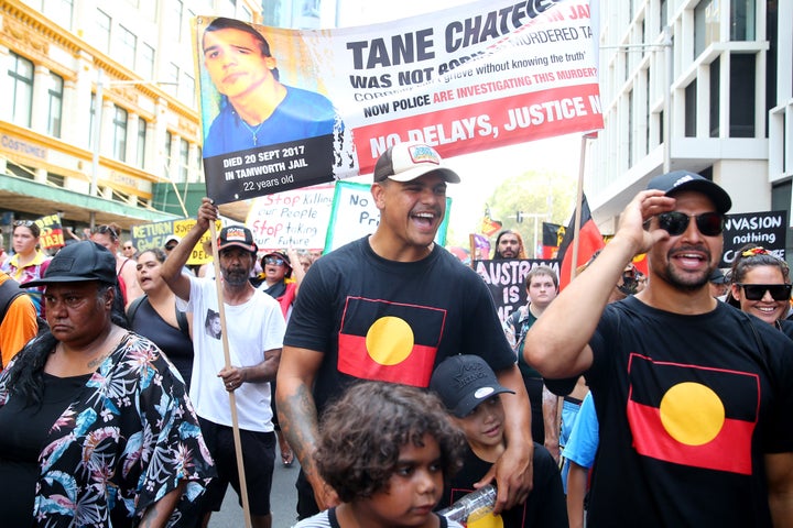 Latrell Mitchell marches down Elizabeth St during a protest march on January 26, 2020 in Sydney, Australia.