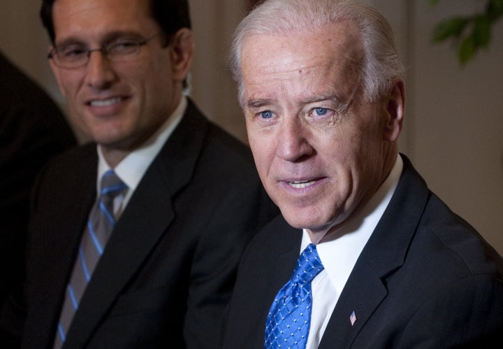 Then-Vice President Joe Biden, right, speaks alongside then-House Majority Leader Eric Cantor (R-Va.) during a debt reduction meeting in May 2011.