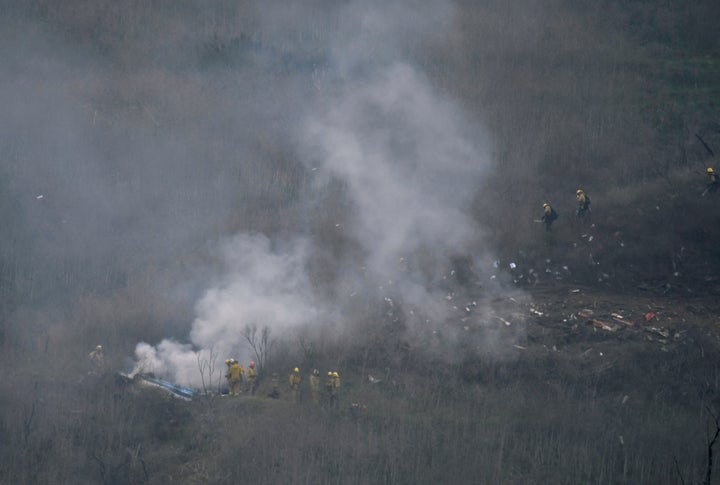 LA county firefighters on the scene of the helicopter crash in Calabasas, California.