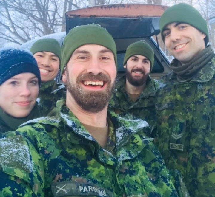 Tiffany Mackey (left) poses with some of her crew while helping out in St. John's.