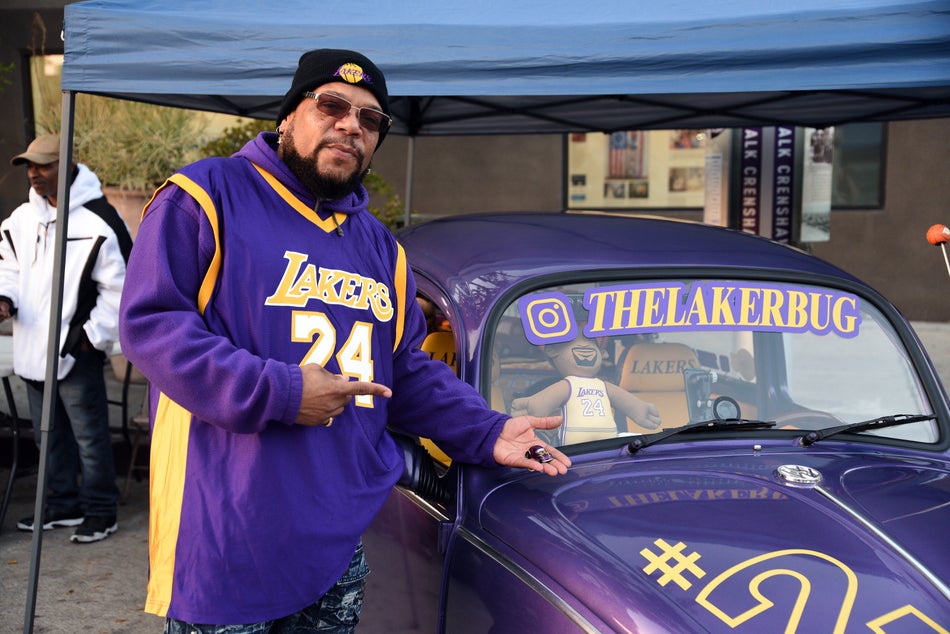 Darrin Dnote Milton with his car, the Laker Bug, at a vigil for Kobe Bryant in Los Angeles on Jan. 26. 