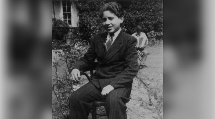 Pinchas Gutter at about age fourteen wearing a new suit in Ascot, England in 1946.