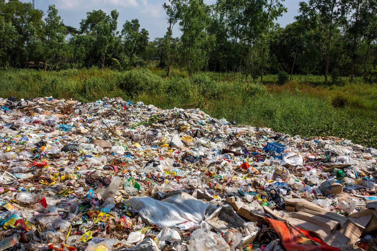 A dump site with plastics beside the road in Mingalun village, in Yangon division, Myanmar.