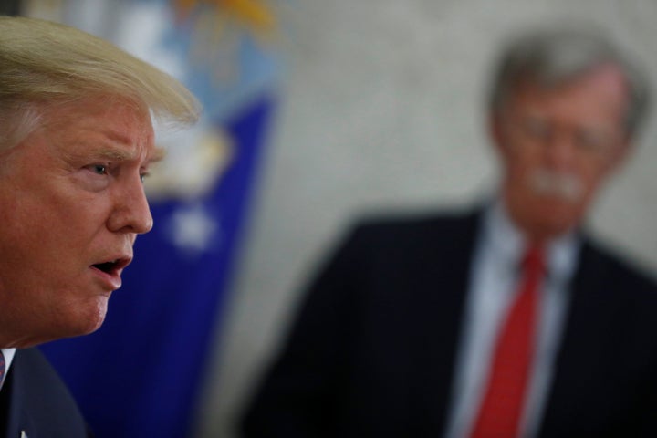 President Donald Trump meets with the Hungarian prime minister on May 13, 2019, as White House national security adviser John Bolton looks on in the Oval Office. 