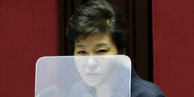 South Korean President Park Geun-hye delivers her speech during a plenary session at the National Assembly...