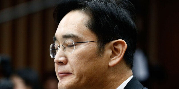 SEOUL, SOUTH KOREA - DECEMBER 06: Lee Jae-Yong, vice chairman of Samsung answers questions during a parliamentary...