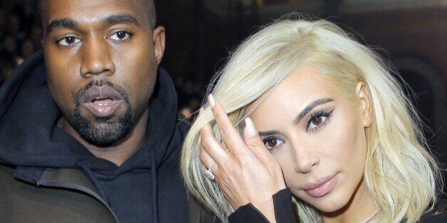 Kanye West and Kim Kardashian arrive for Lanvin's ready-to-wear Fall-Winter 2015/2016 fashion collection,...
