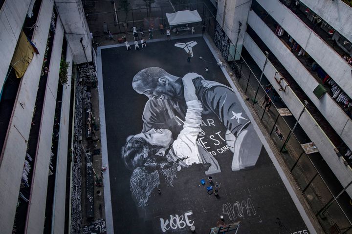 A giant mural of former NBA star Kobe Bryant and his daughter Gianna, painted hours after their death, is seen at a basketball court on Jan. 28, 2020, in the basketball-obsessed Philippines. 