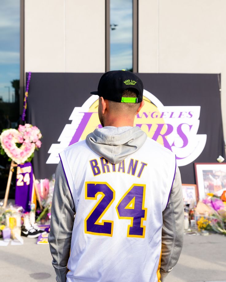 A fan wears a Kobe Bryant jersey outside of the Los Angeles Lakers training facility in El Segundo, California.