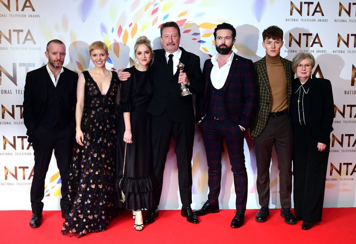 Anthony Byrne, Kate Philips, Sophie Rundle, Steven Knight, Emmett J. Scanlan, Harry Kirton and guest (left to right) accepting the Best Drama award for Peaky Blinders