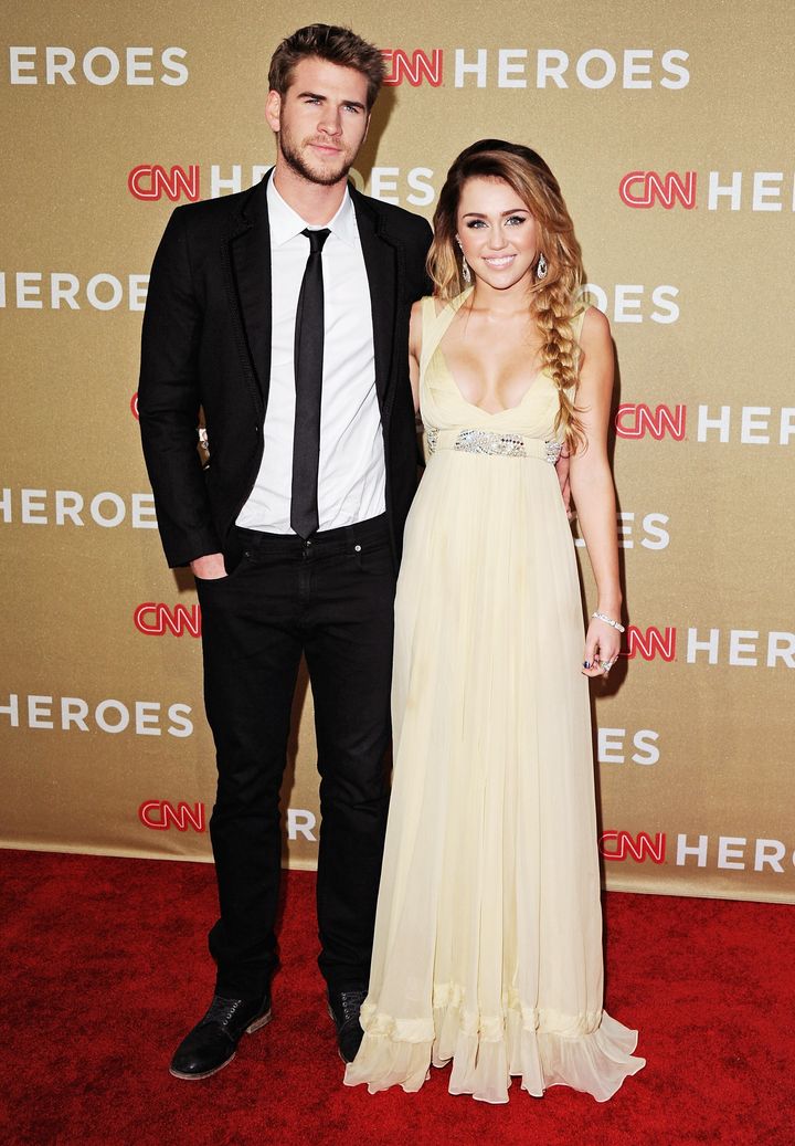 Liam and Miley at an event in 2011
