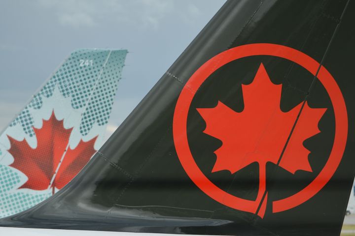 Air Canada airplanes are seen here at at Calgary International Airport on Sept. 10, 2018. The Canadian airline says it was cancelling some flights to China amid the coronavirus outbreak. 