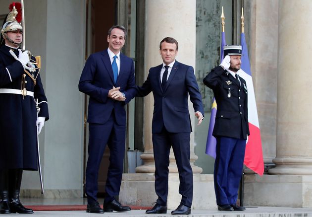 French President Emmanuel Macron welcomes Greek Prime Minister Kyriakos Mitsotakis at the Elysee Palace...