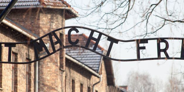 Museum of Holocaust Auschwitz Birkenau. The inscription above the main gate to concentration camp Auschwitz. work makes you free. Sentence, work makes you free.