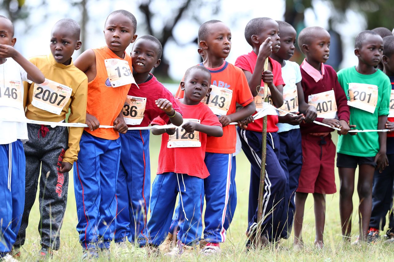 ELDORET, KENYA - JANUARY 26: Young runner line up ahead of their race during the 29th Discovery Cross Country Championships at Eldoret Sports Club on January 26, 2020 in Eldoret, Kenya. (Photo by Michael Steele/Getty Images)