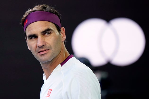 Tennis - Australian Open - Quarter Final - Melbourne Park, Melbourne, Australia - January 28, 2020 - Switzerland’s Roger Federer reacts after wining his match against Tennys Sandgren of the U.S. REUTERS/Kim Hong-Ji