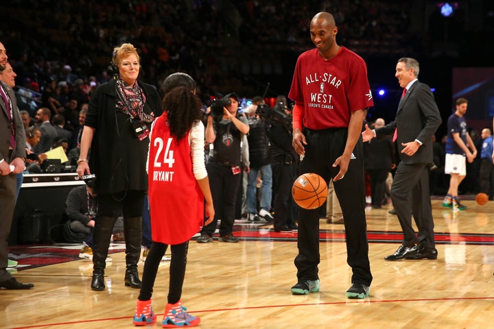 The two warming up together on the court.&nbsp;