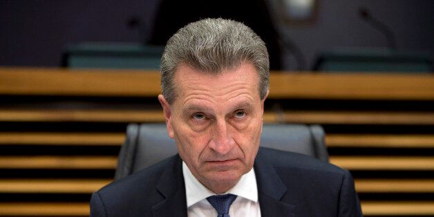 European Commissioner for Digital Economy Guenther Oettinger waits for the start of the weekly commission college meeting at EU headquarters in Brussels on Wednesday, Jan. 13, 2016. (AP Photo/Virginia Mayo)