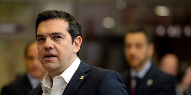 Greek Prime Minister Alexis Tsipras leaves at the end of the European Union summit on the ongoing refugee crisis in Brussels on March 18, 2016. / AFP / THIERRY CHARLIER (Photo credit should read THIERRY CHARLIER/AFP/Getty Images)