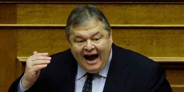 This photo taken on Sunday, Dec. 7, 2014 shows leader of Pasok (Panhellenic Socialist Movement) Evangelos Venizelos, 58, speaks during a parliament meeting for a vote on the country's 2015 budget in Athens. Greece goes to the polls on Sunday, Jan. 25, 2015 in a snap general election as the country was showing tentative signs of emerging from a deep financial crisis that has disturbed the eurozone. The vote, held more than a year early, has once more raised the specter of Grexit _ a Greek exit from Europeâs joint currency. (AP Photo/Thanassis Stavrakis)