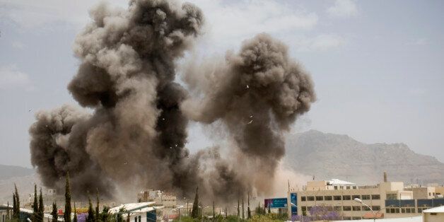Smoke billows from a Saudi-led airstrike on Sanaa, Yemen, Wednesday, April 8, 2015. A state-run broadcaster in Iran is reporting that the Islamic Republic has sent a navy destroyer and another vessel to waters near Yemen amid a Saudi-led airstrike campaign. (AP Photo/Hani Mohammed)