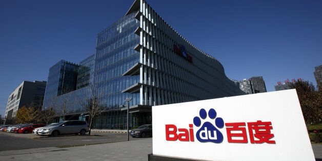 The Baidu Inc. logo is displayed outside company's headquarters in Beijing, China, on Wednesday, Nov. 12, 2014. While Beijing-based Baidu, owner of China's most-used search-engine, is available around the world, more than 99 percent of its revenue comes from China. Photographer: Tomohiro Ohsumi/Bloomberg via Getty Images